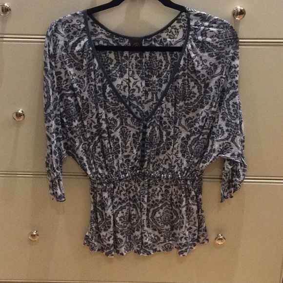 Language of Los Angeles sheer deep v tunic